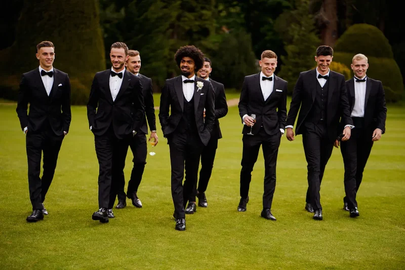 A cool wedding photo of a groom and his groomsmen by wedding photographer ARJ Photography®