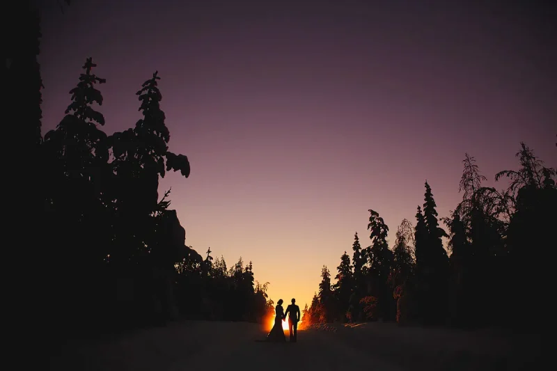 Sunset wedding photo at an amazing destination wedding in Finnish Lapland by destination wedding photographer ARJ Photography®