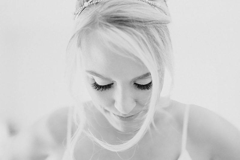 A high key black and white portrait of a bride - powerful black and white wedding photography by ARJ Photography®