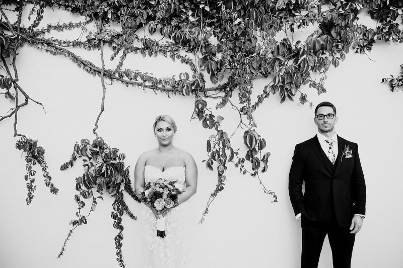 A quirky black and white portrait of a bride and groom at a destination wedding in Cyprus - powerful black and white wedding photography by ARJ Photography®