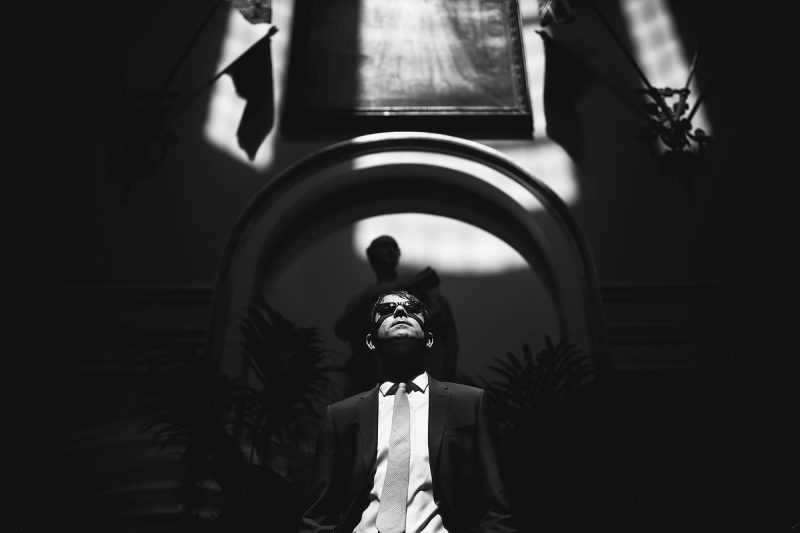 A cool black and white portrait of a groom before his Liverpool wedding - powerful black and white wedding photography by ARJ Photography®
