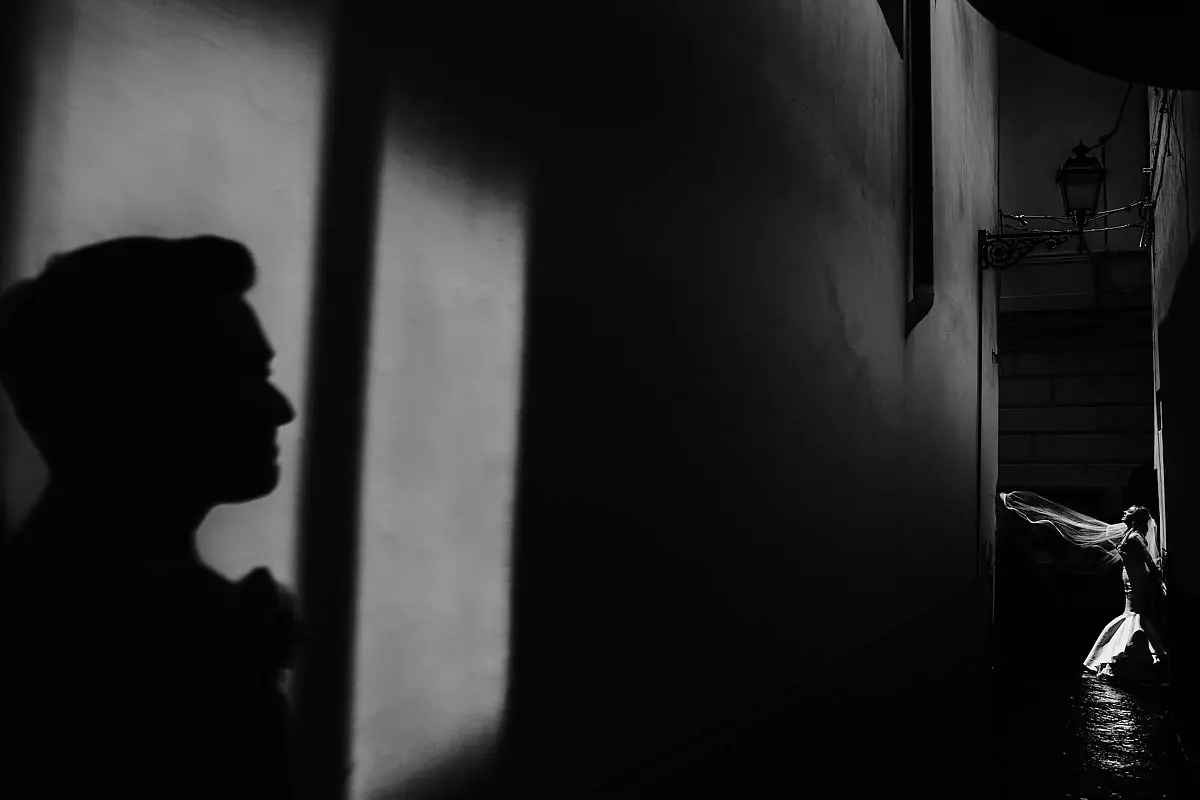 Dramatic and artistic black and white portrait of a bride and groom at a destination wedding - artistic wedding photography by ARJ Photography®