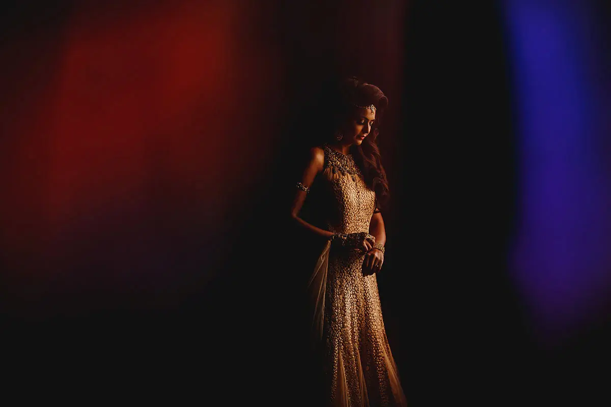 Dark and moody portrait of a bride getting ready for her wedding in Cardiff - artistic wedding photography by ARJ Photography®