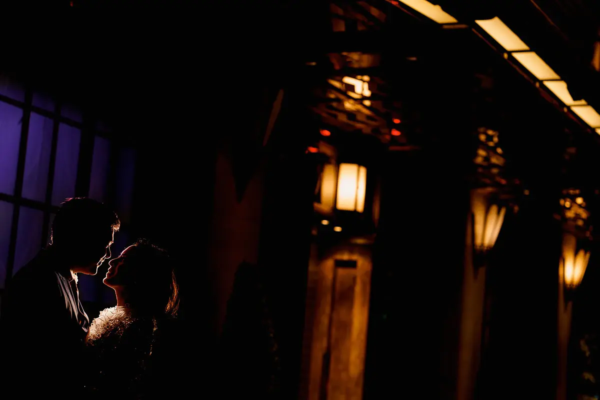 A dramatic and creative portrait of a bride and groom at a Claridges wedding in London - artistic wedding photography by ARJ Photography®