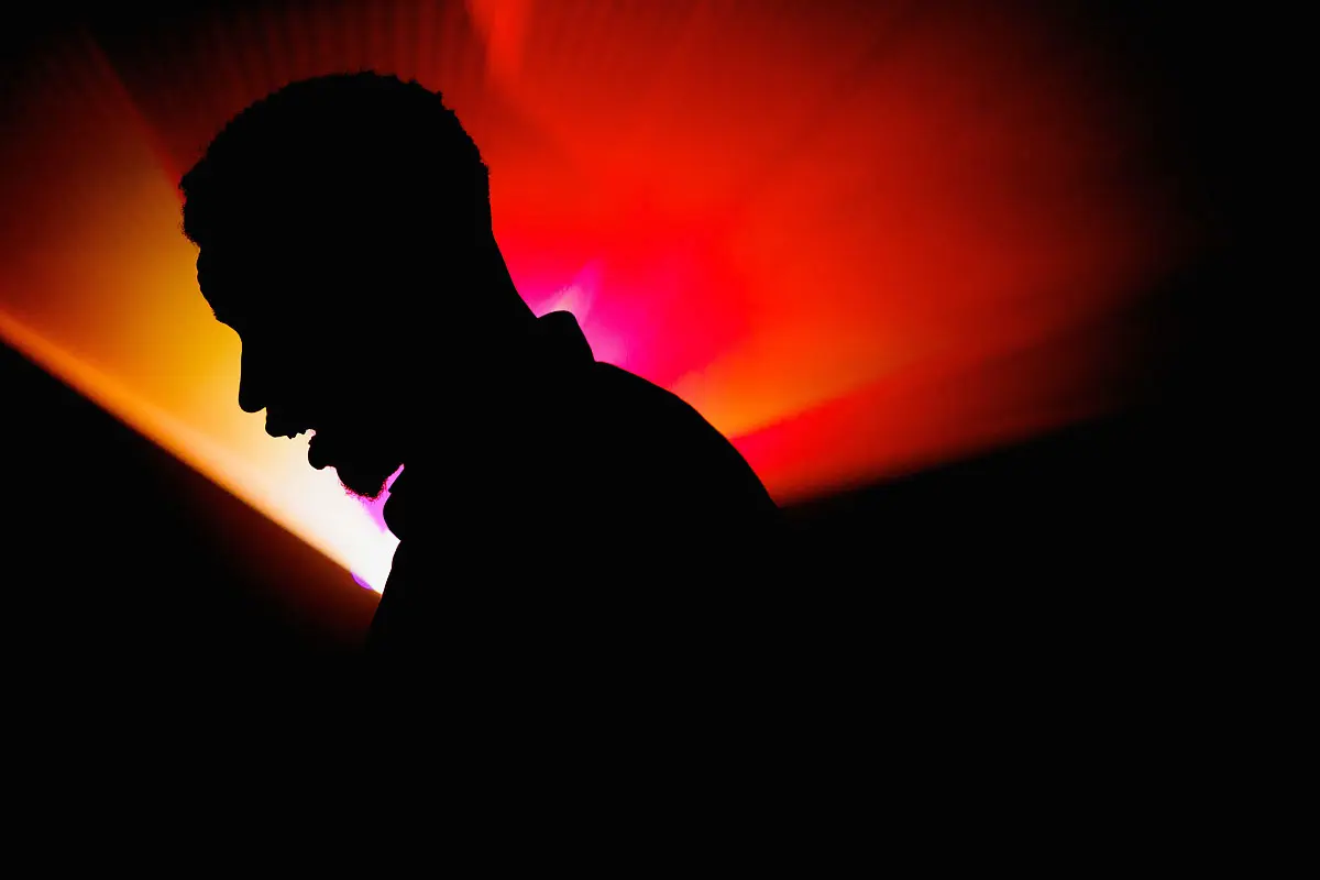 Cool photo of a groom during his wedding party at a destination wedding in Nice France - artistic wedding photography by ARJ Photography®