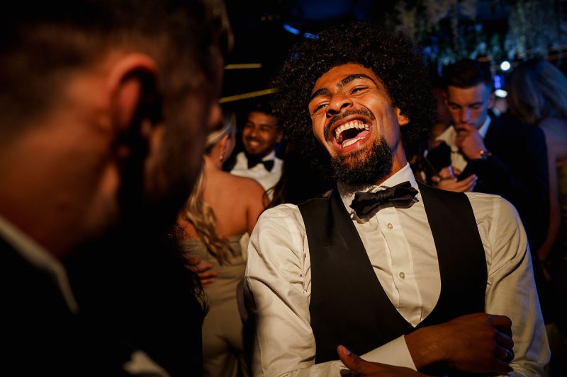 A groom enjoying his wedding party - epic wedding party photo by ARJ Photography®