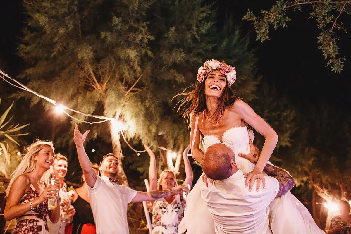 A high energy first dance moment at a destination wedding in Pefkos on the island of Rhodes in Greece by destination wedding photographer ARJ Photography®