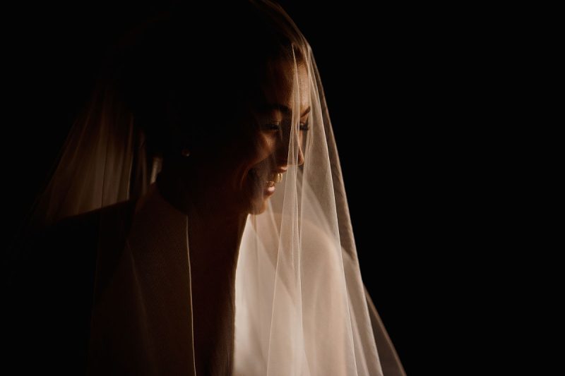 Dramatic happy portrait of a bride on the morning of her wedding - incredible wedding portraits by ARJ Photography®