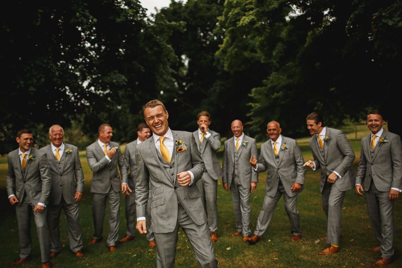 A happy groom and his groomsmen at a Yorkshire wedding - incredible wedding portraits by ARJ Photography®